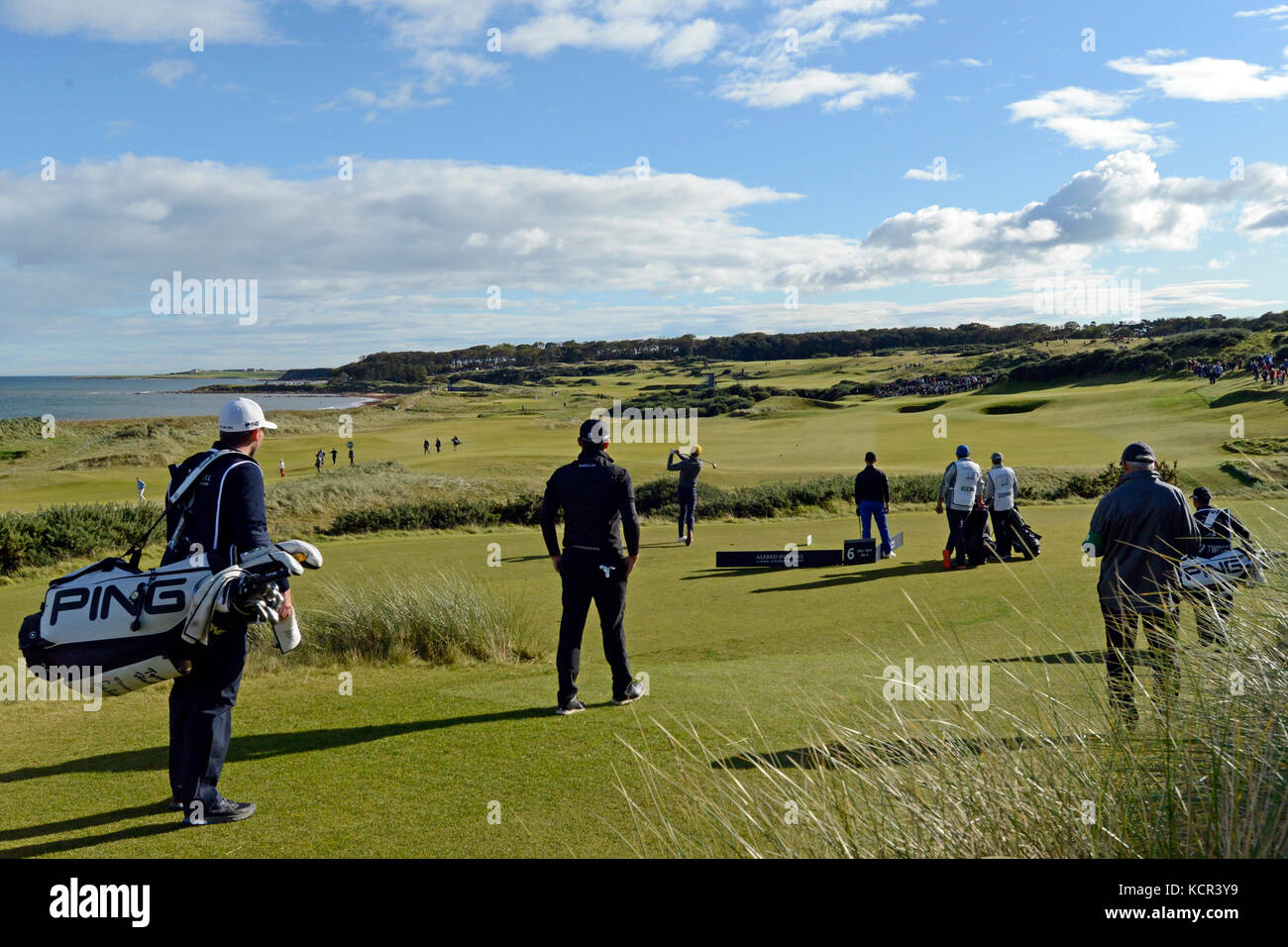 St Andrews, Scotland, United Kingdom. 07th Oct, 2017. Tyrell Hatton (2nd L) pauses while his playing partner actor Jamie Dornan (3rd L) drives in the autumn sunshine, as Hatton maintains a commanding lead in the closing stages of the Alfred Dunhill Links Championship third round, Credit: Ken Jack/Alamy Live News Stock Photo
