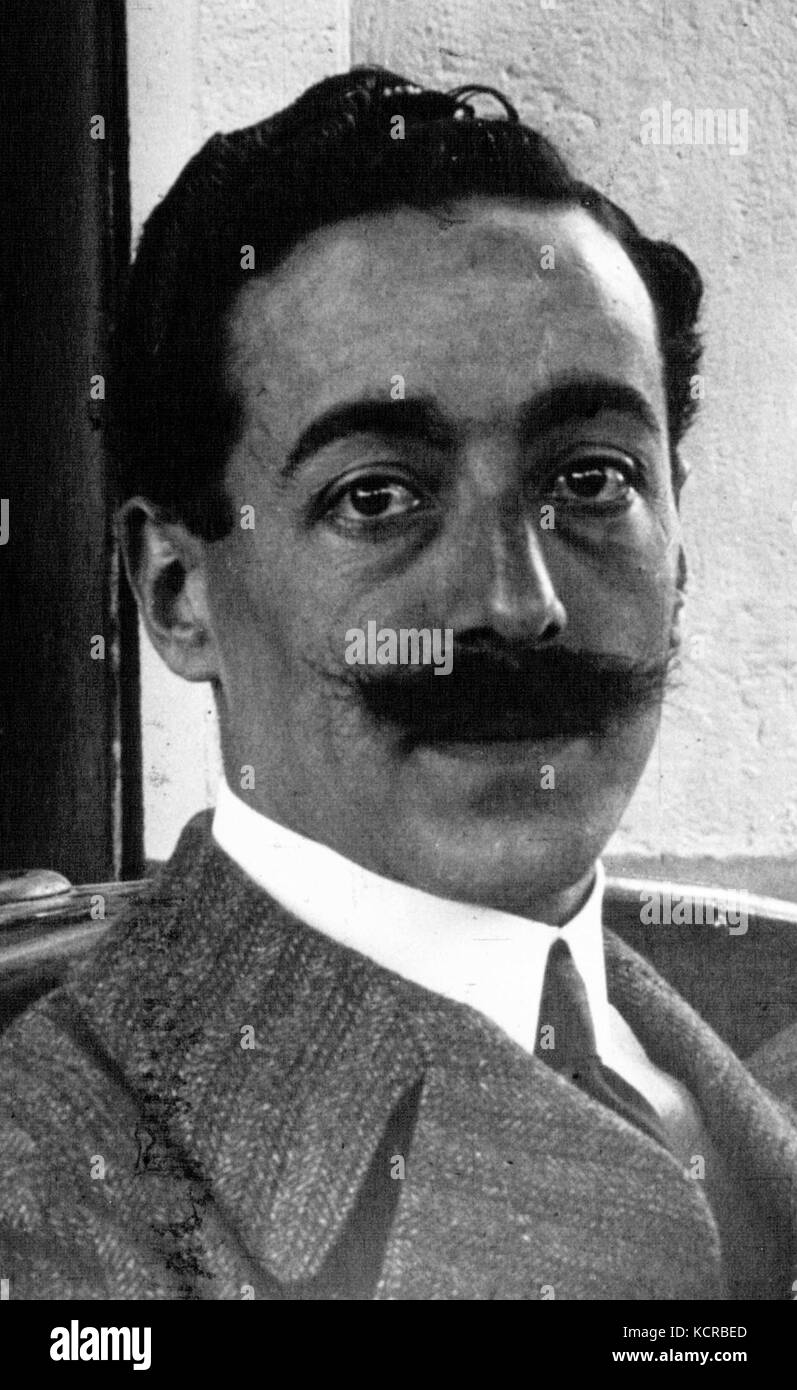 A cropped photograph of Alessandro Cagno, an Italian race car driver, participating in the 1914 French Grand Prix, capturing a key moment from the race. Stock Photo