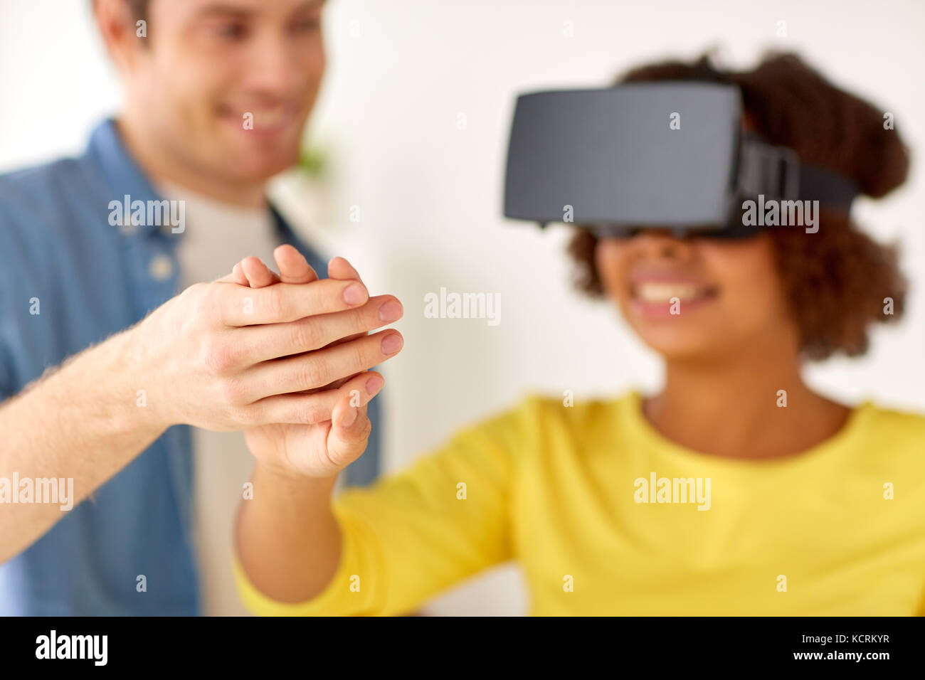 happy couple with virtual reality headset at home Stock Photo - Alamy
