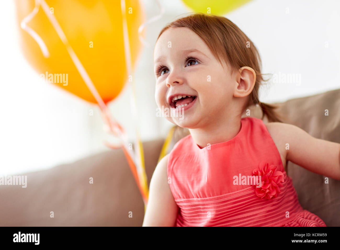 happy baby girl on birthday party at home Stock Photo - Alamy