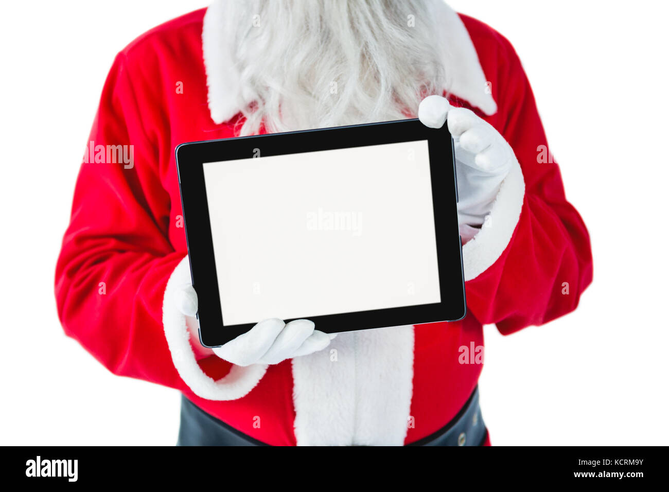 Mid-section of Santa Claus holding digital tablet against white ...