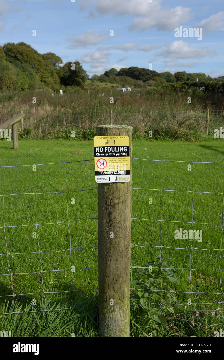 No fouling notice on wooden fence post in Burrs country park bury lancashire uk Stock Photo