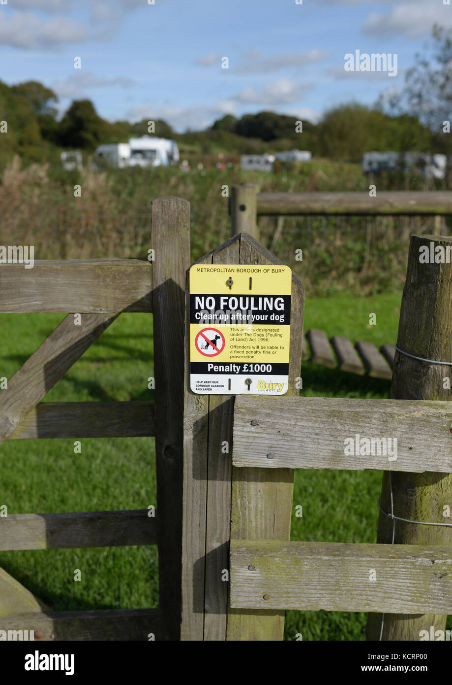 No fouling notice on wooden post in Burrs country park Bury lancashire uk Stock Photo