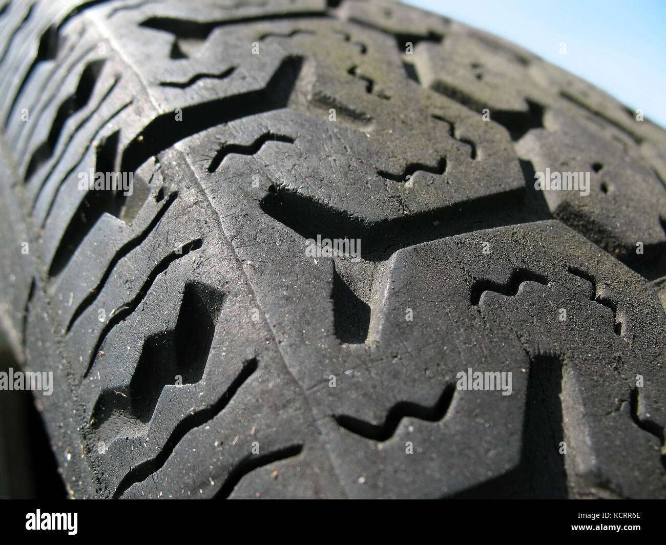 Extreme closeup of used car tire tread Stock Photo