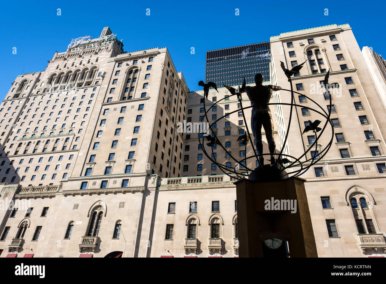 Fairmont Royal York Hotel facade with the Monument to Multiculturalism on the foreground, downtown Toronto, Ontario, Canada. Stock Photo