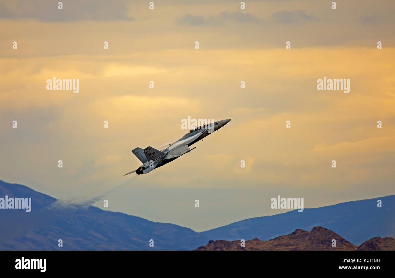 In this shot a U.S. Navy E/F-18F Super Hornet performs at the Historic Wendover Airfield Air Show in Wendover, Utah, USA. Stock Photo