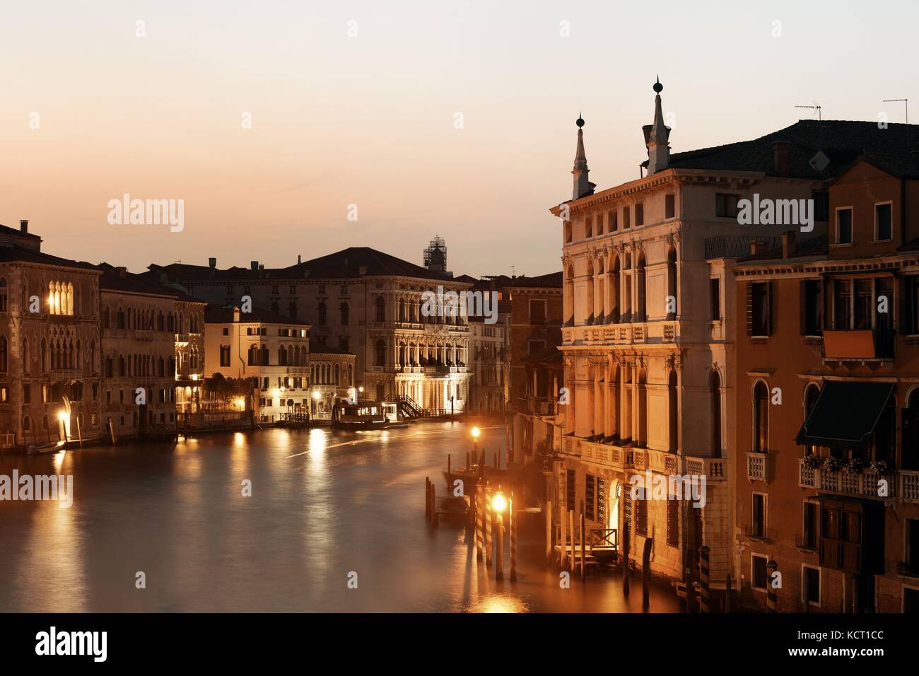 Venice canal view at night with historical buildings. Italy Stock Photo ...