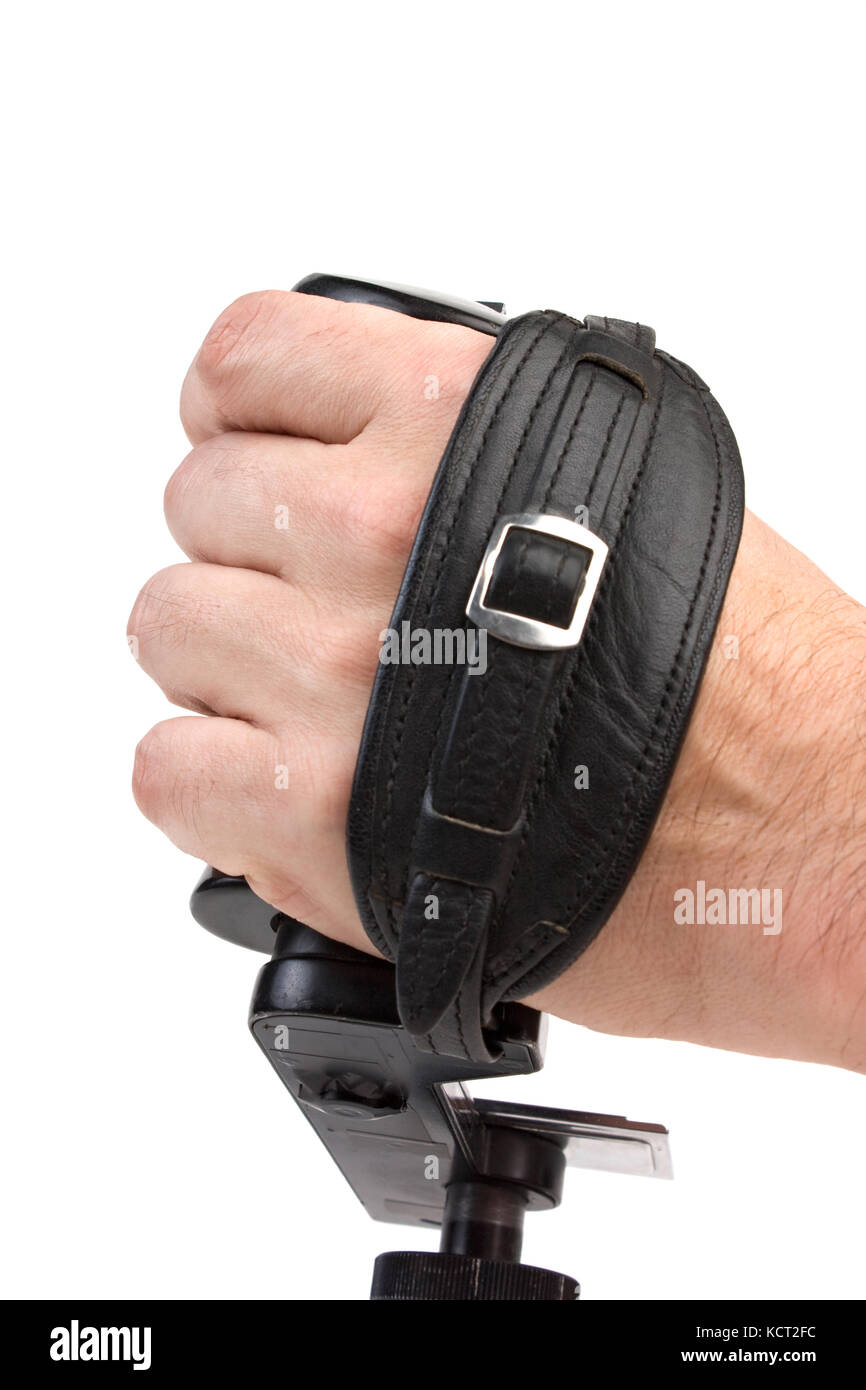 hand holds the handle of the camera isolated on white background Stock ...