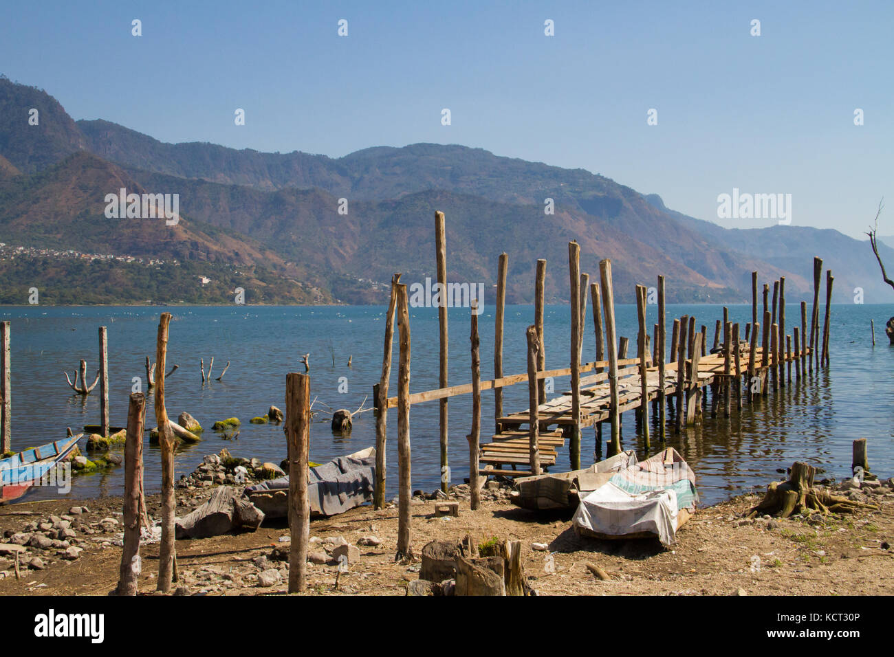 Wooden jetty on edge of the lake, Lake Atitlan, Guatemala, 2017 Stock Photo