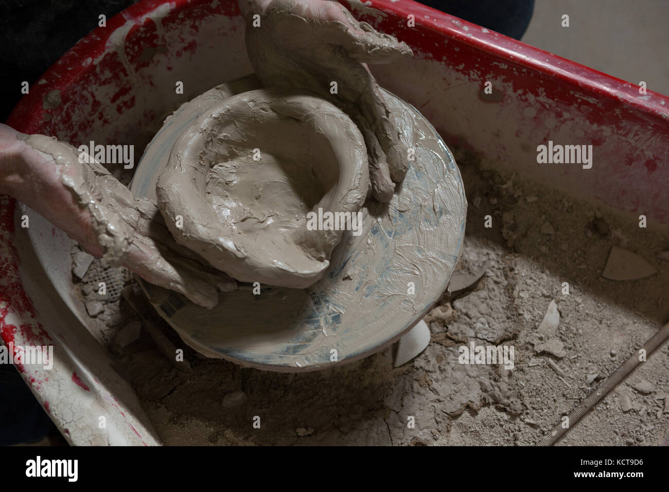 Male potters hand making a pot in pottery workshop Stock Photo - Alamy