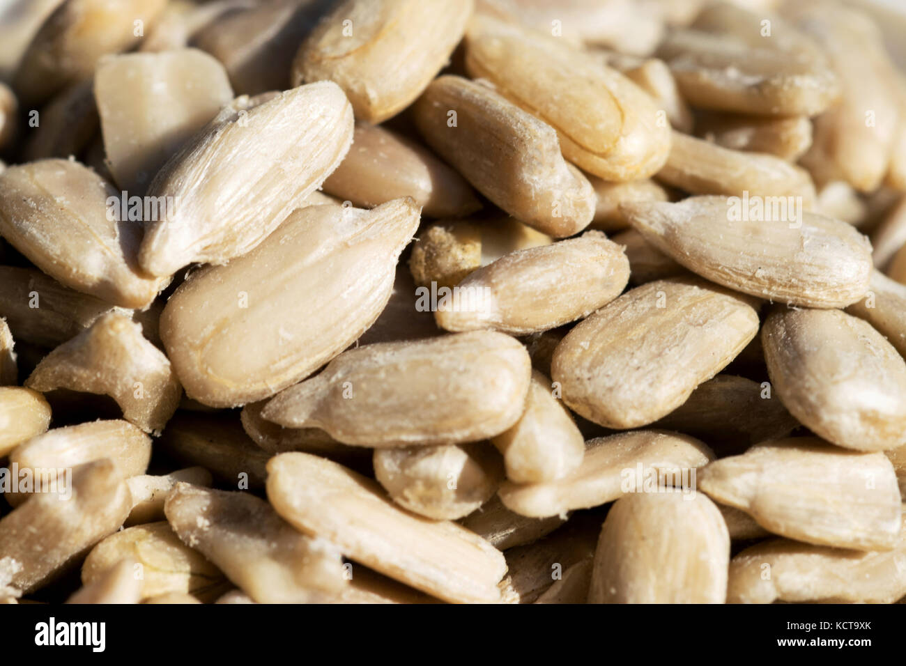 Peeled sunflower seeds Stock Photo - Alamy