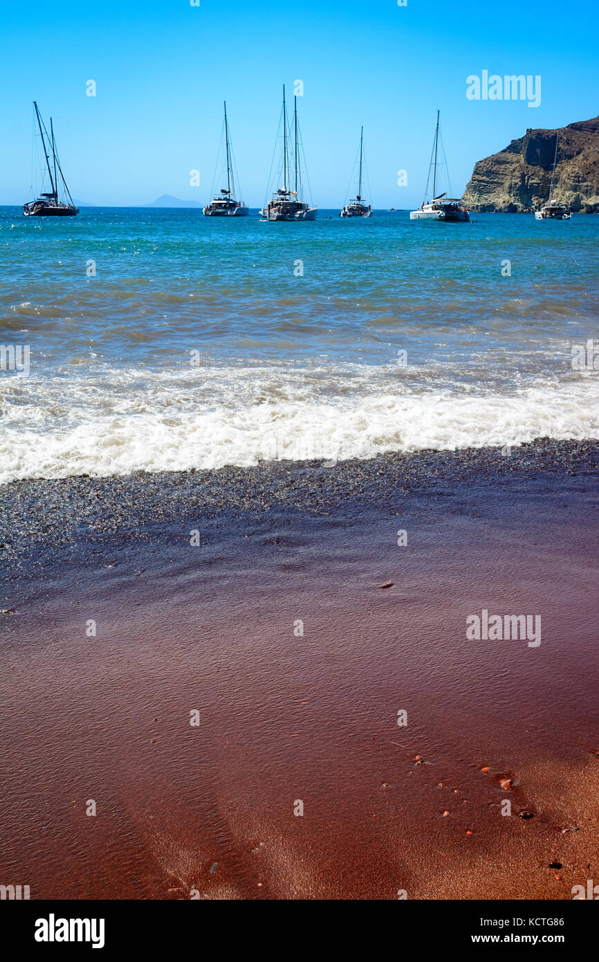 Red Beach, Akrotiri, Greece, Cyclades Islands - Santorini-Thira- one of the most famous beaches of island known for unique color of the sand and surro Stock Photo