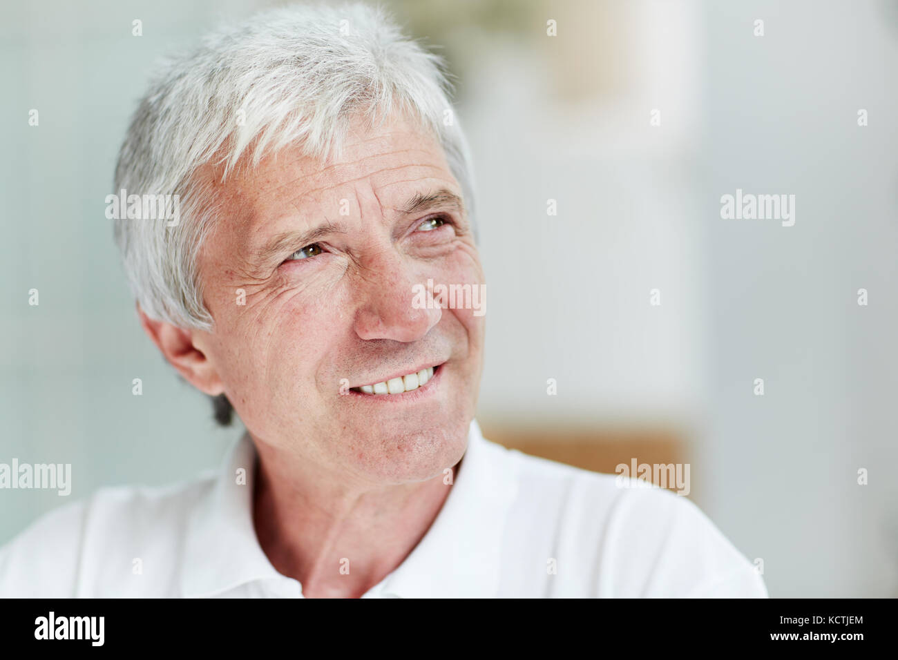 Senior Man with Warm Smile Stock Photo