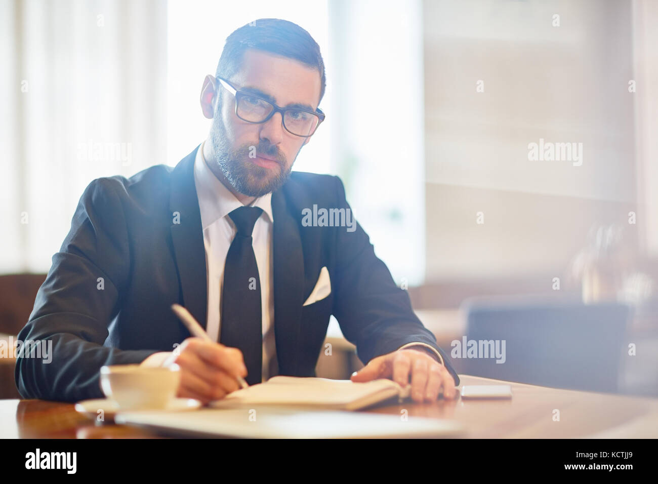 Man making notes Stock Photo