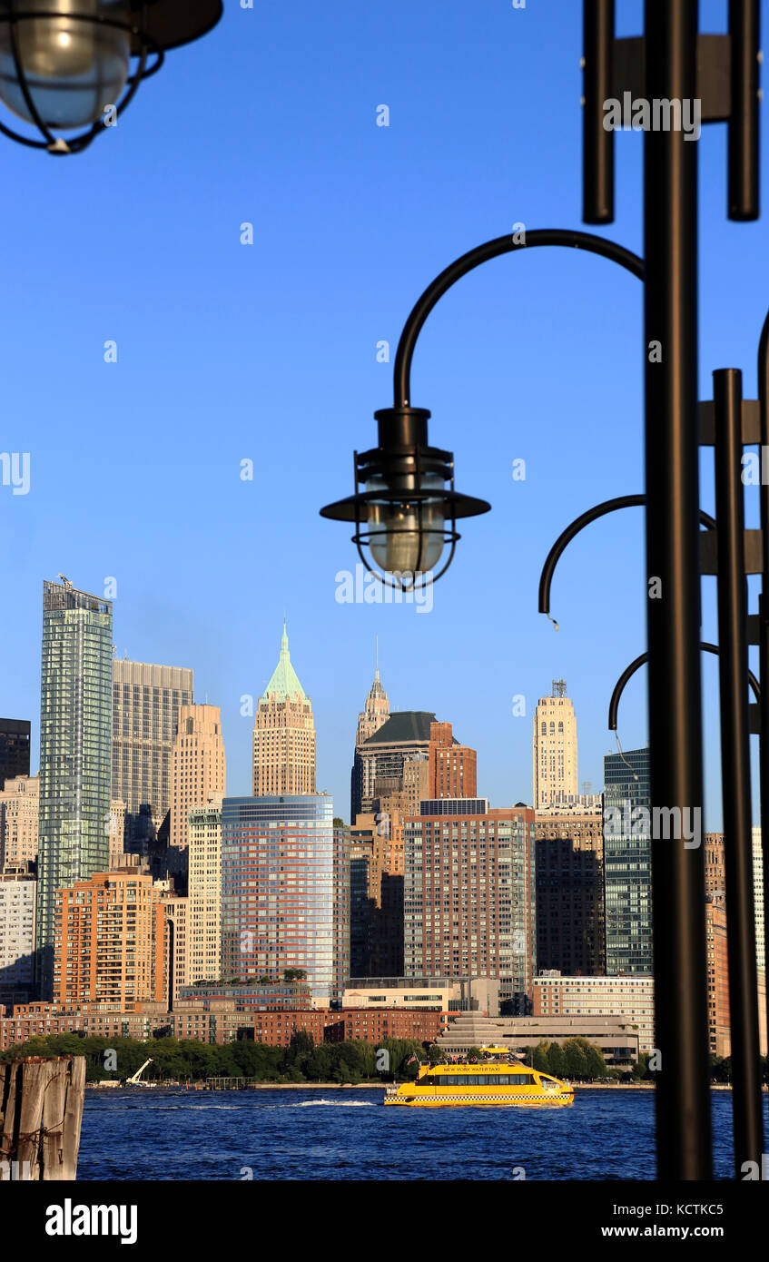 Skyline of Financial District in lower Manhattan with lampposts of old