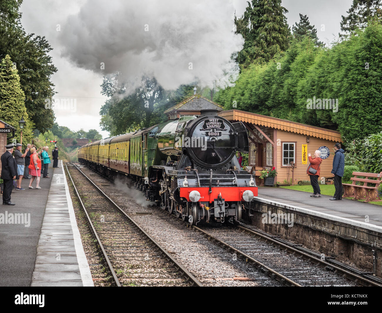 The Flying Scotsman 60103 steam locomotive at Crowcombe Heathfield railway station, Somerset, England, UK. Stock Photo