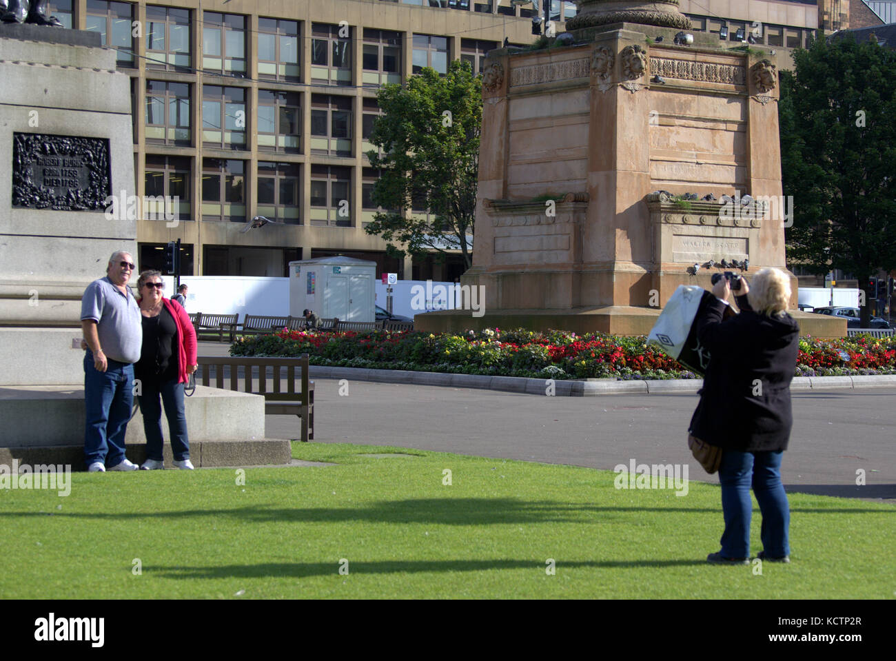 tourist photography taking pictures George square Glasgow Stock Photo