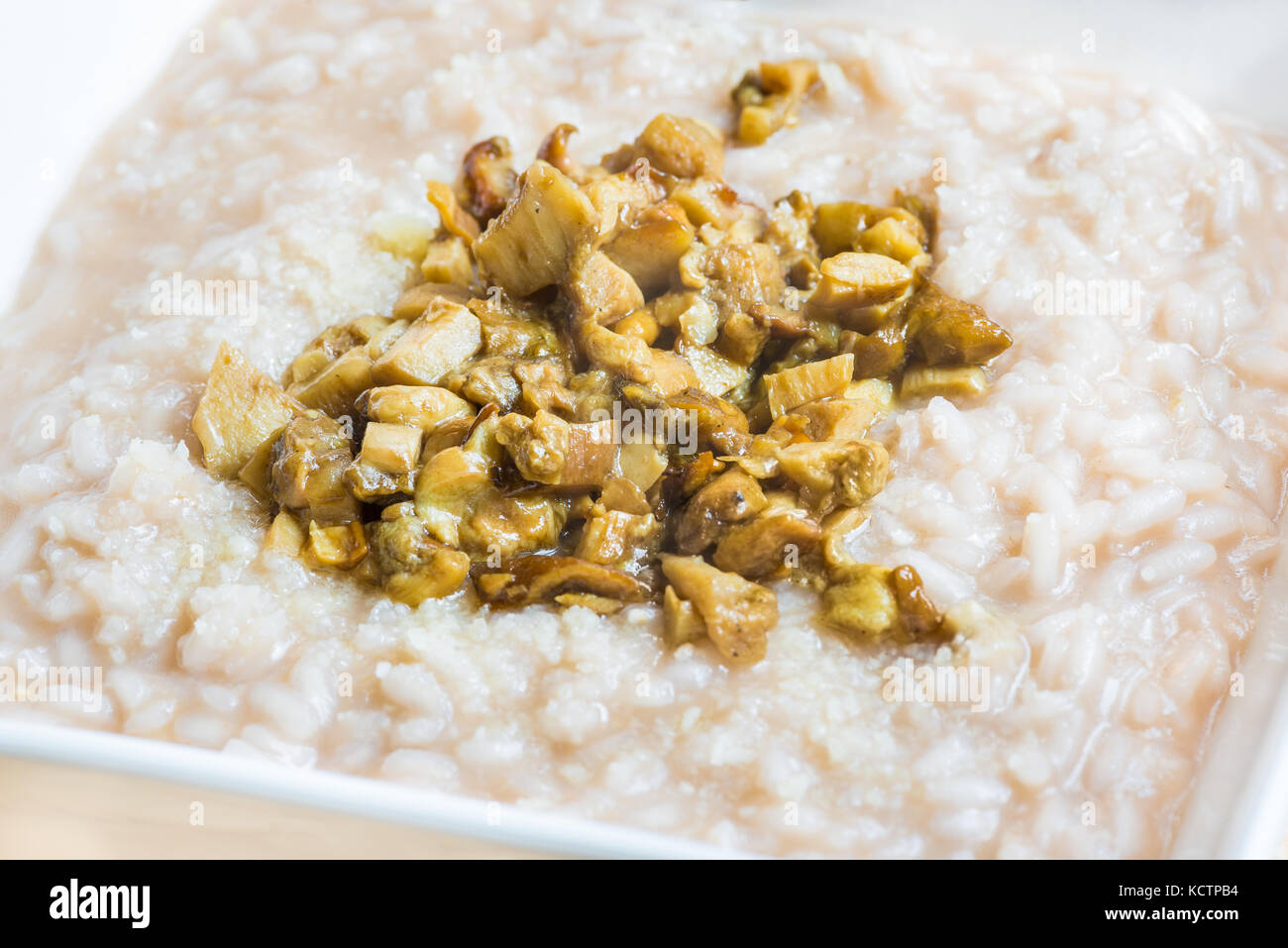 Rice with porcini mushrooms (boletus edulis) Stock Photo