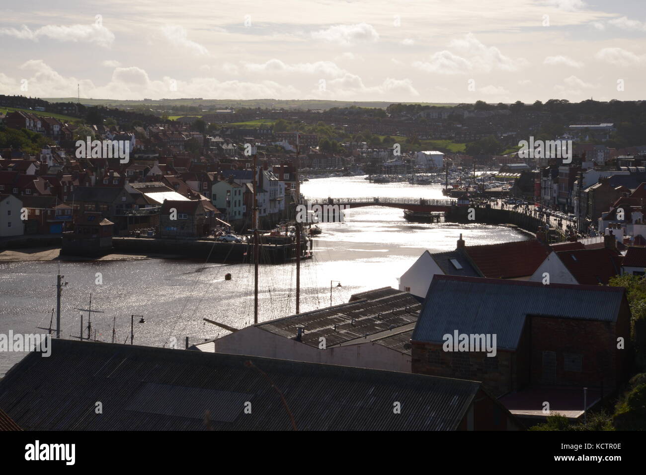 Looking down from an elevated position over Whitby harbour on a sunny autumn day Stock Photo