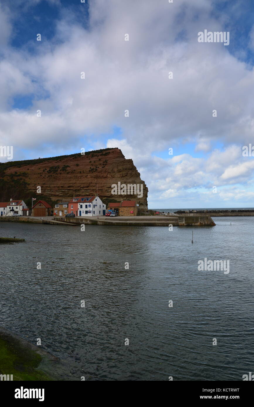 View of the cliffs and houses, Staithes, North Yorkshire UK Stock Photo