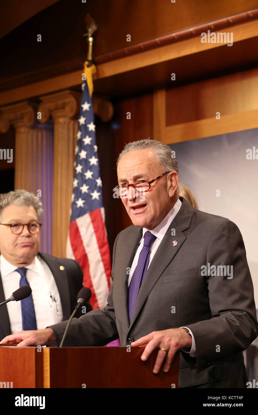 U.S Senator Minority Leader Chuck Schumer of New York, alongside fellow Democrats holds a press conference in the wake of a massive data breach at Equifax and a scandal at Wells Fargo on Capitol Hill September 27, 2017 in Washington, DC. Stock Photo