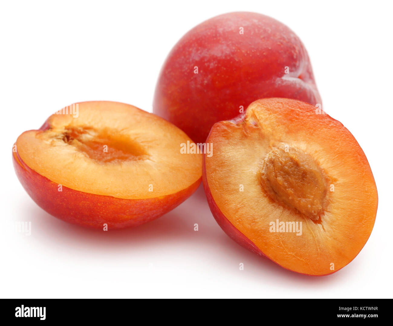 Fresh plums over white background Stock Photo Alamy