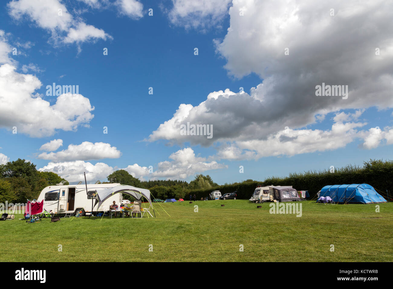 Caravans and tents on campsite, Wales, UK Stock Photo