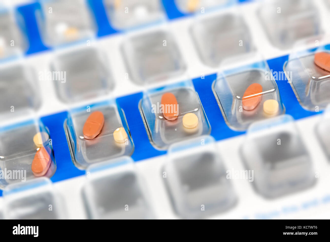 Pills in blister pack prepared doses for elderly patient with dementia Stock Photo