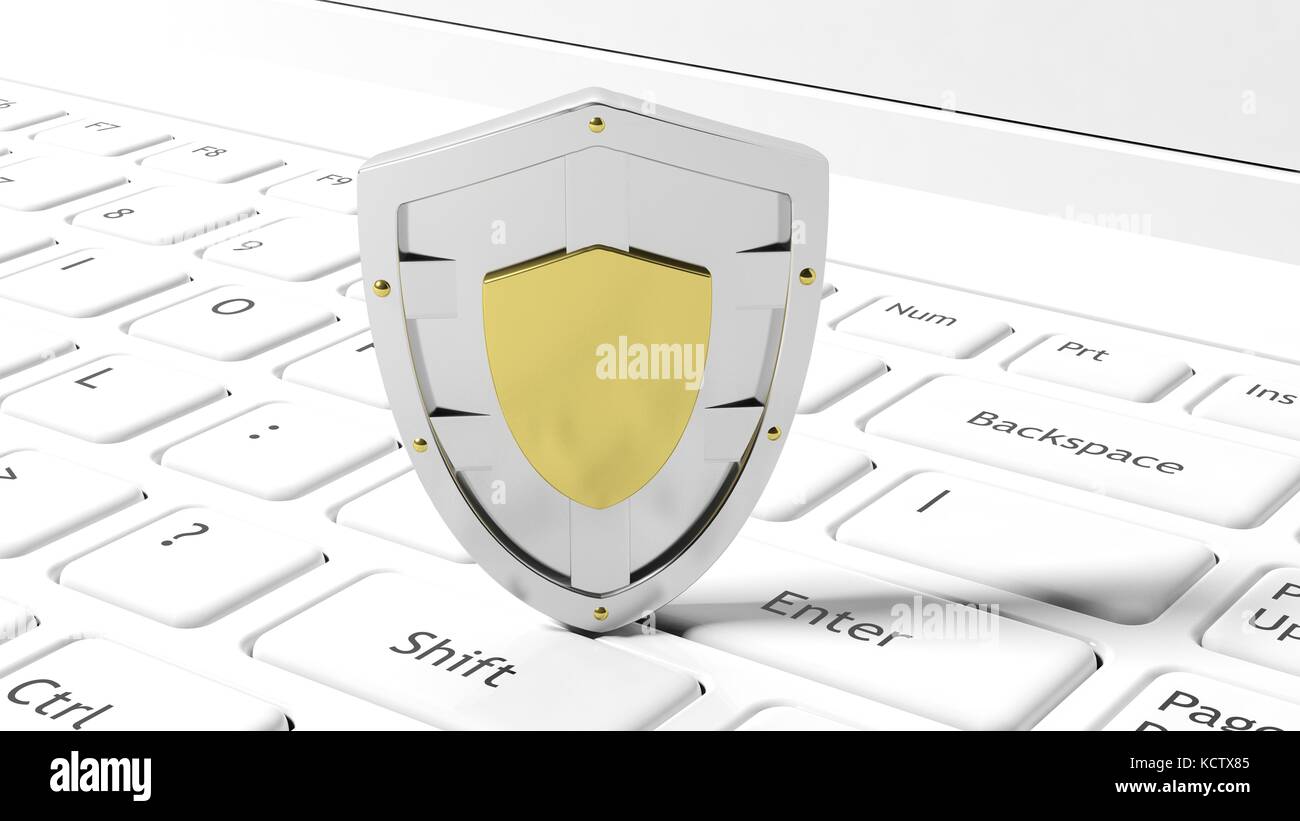 Silver shield symbol on laptop white keyboard Stock Photo