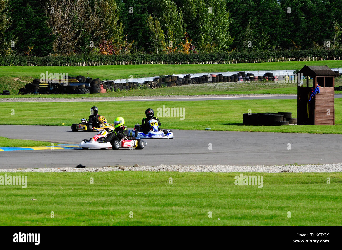 Go Karting around a race track Stock Photo