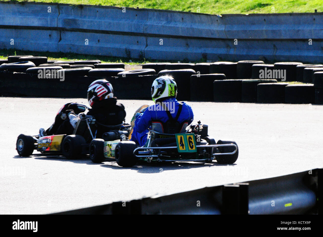 Go karting around a race track Stock Photo