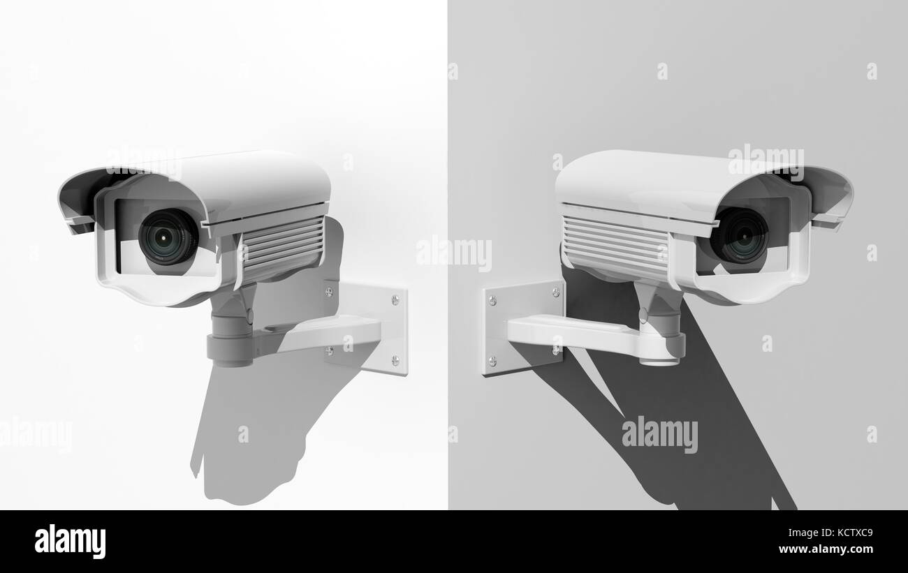 Two security surveillance cameras on white wall corner Stock Photo Alamy