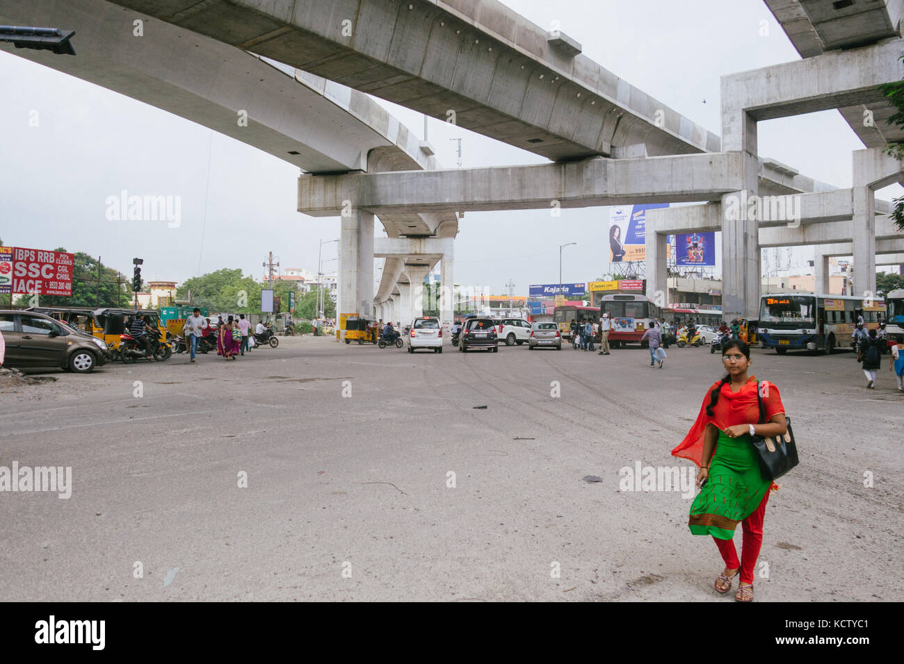 HYDERABAD,INDIA-07th OCTOBER,2017.Indian woman walking at a busy street in Hyderabad,India Stock Photo