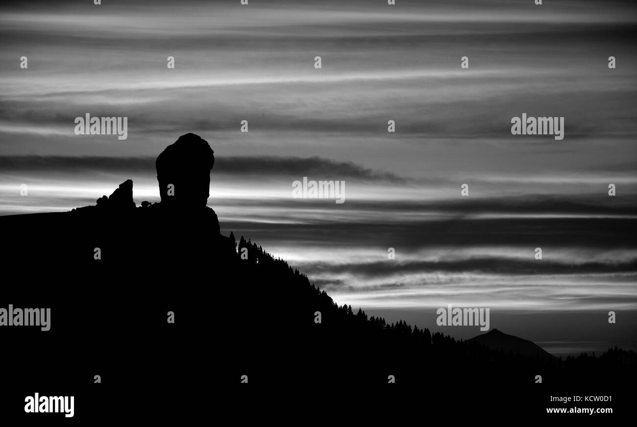 Roque Nublo backlit at sunset, black and white, Canary islands Stock Photo