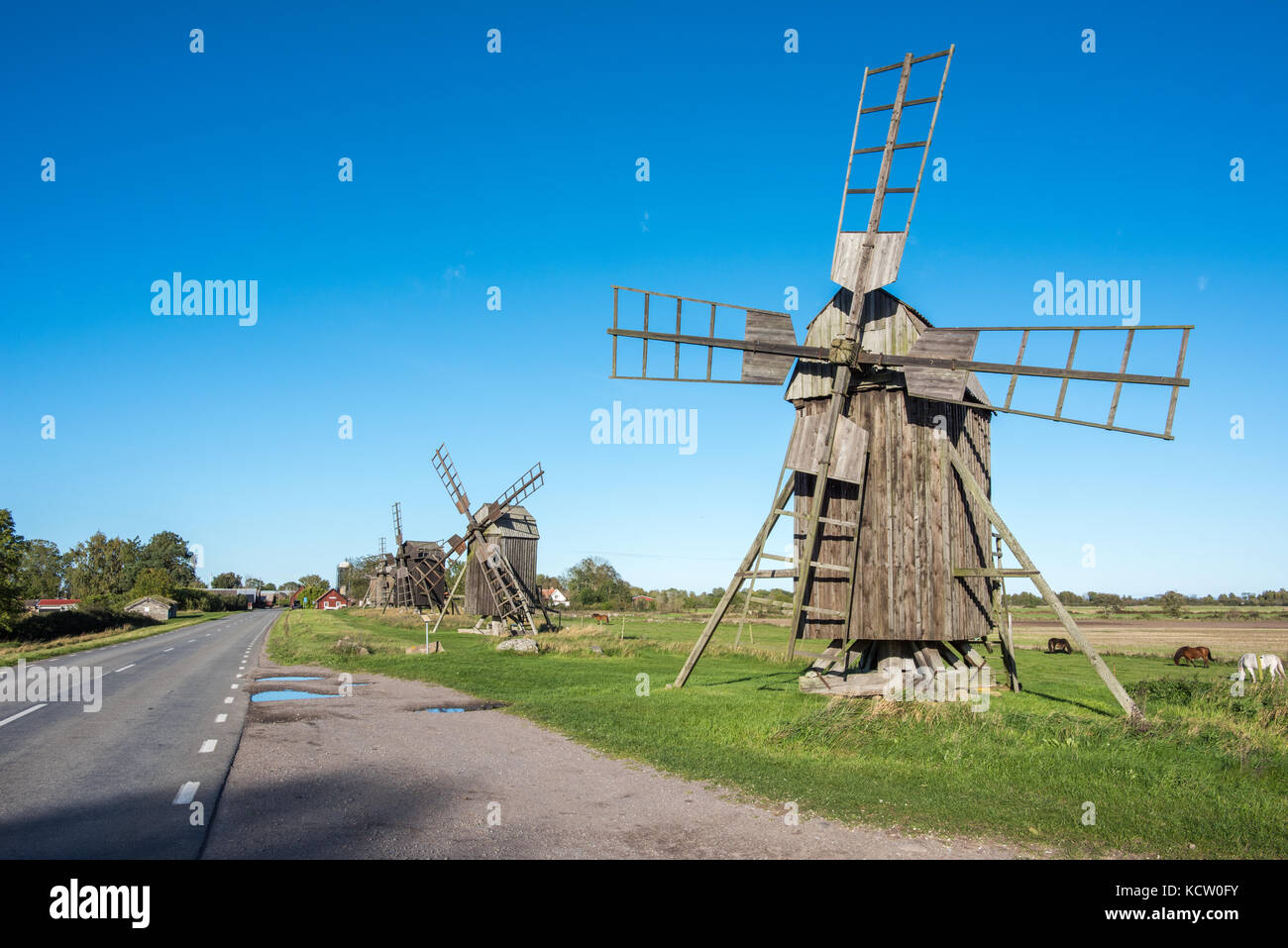 Traditional windmills at Lerkaka on Swedish island Oland in the Baltic Sea. Windmills are a common sight on Oland. Stock Photo