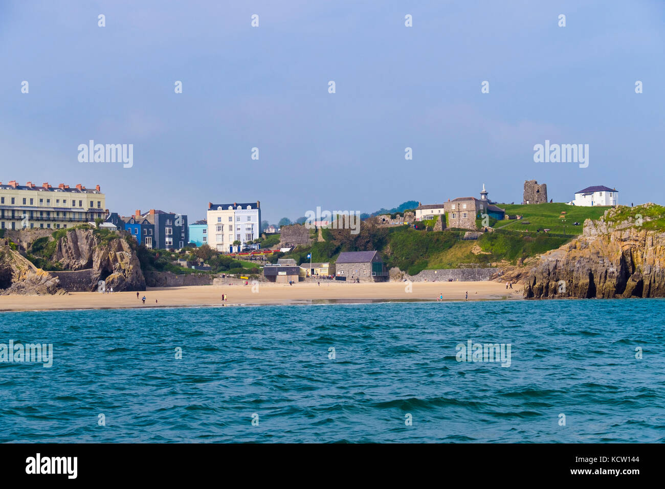 Offshore view across sea water to Castle Beach in Pembrokeshire Coast National Park resort. Tenby, Carmarthen Bay, Pembrokeshire, Wales, UK, Britain Stock Photo