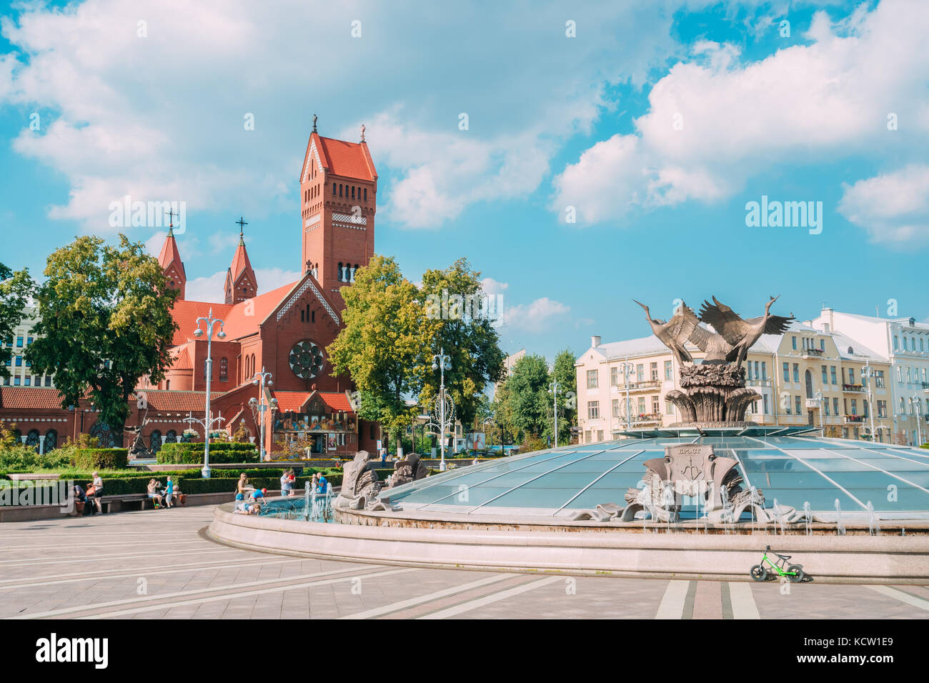 Minsk, Belarus. The Independence Square With Glass Dome Of Stolica Stolitsa, Underground Shopping Center And View Of Roman Catholic Red Church Of Sain Stock Photo