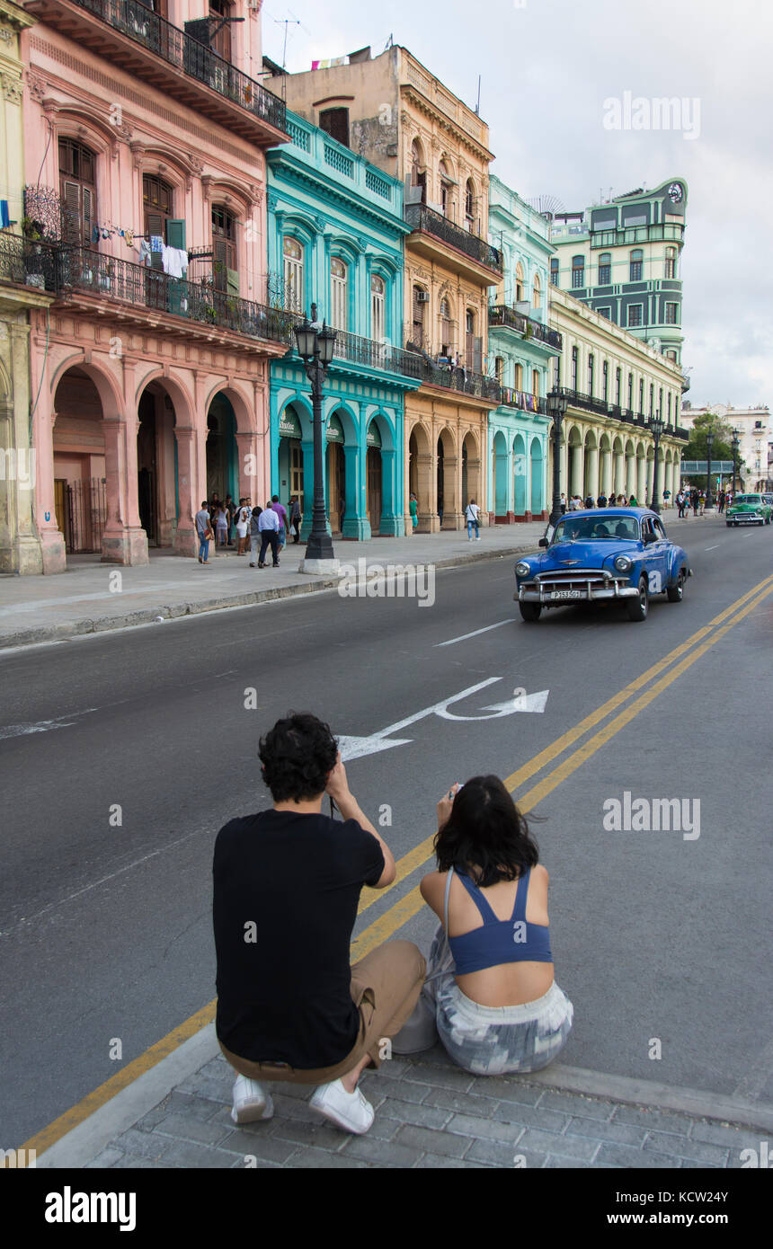 Visitors, photographing old cars, Habana Vieja, Old Havana,  Cuba Stock Photo