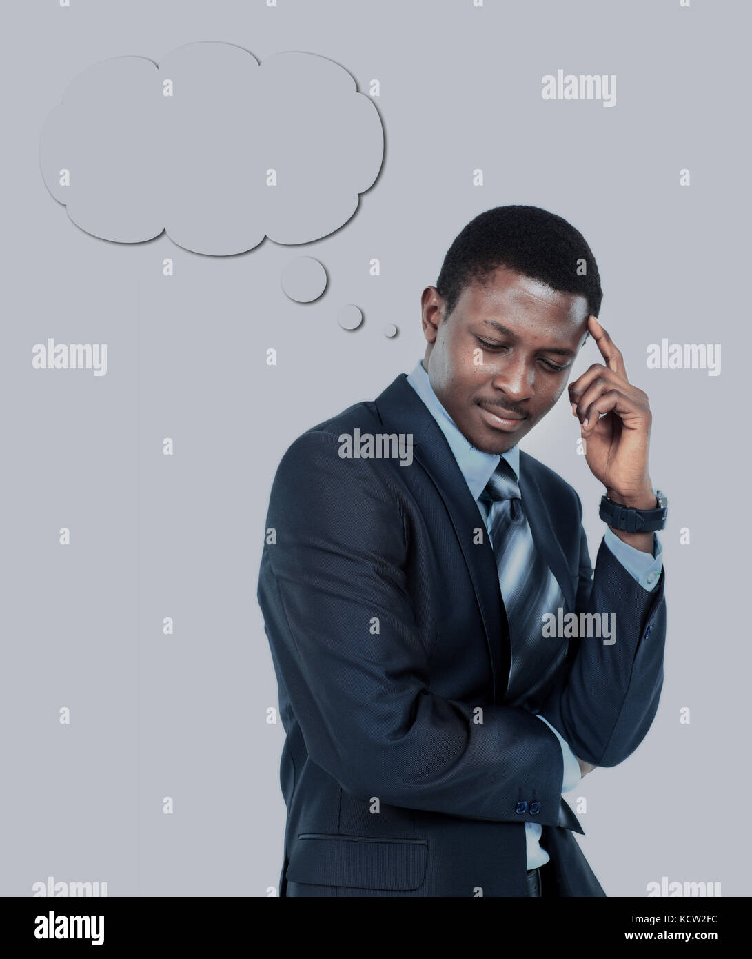 Young business man holding his head in pain against white background ...