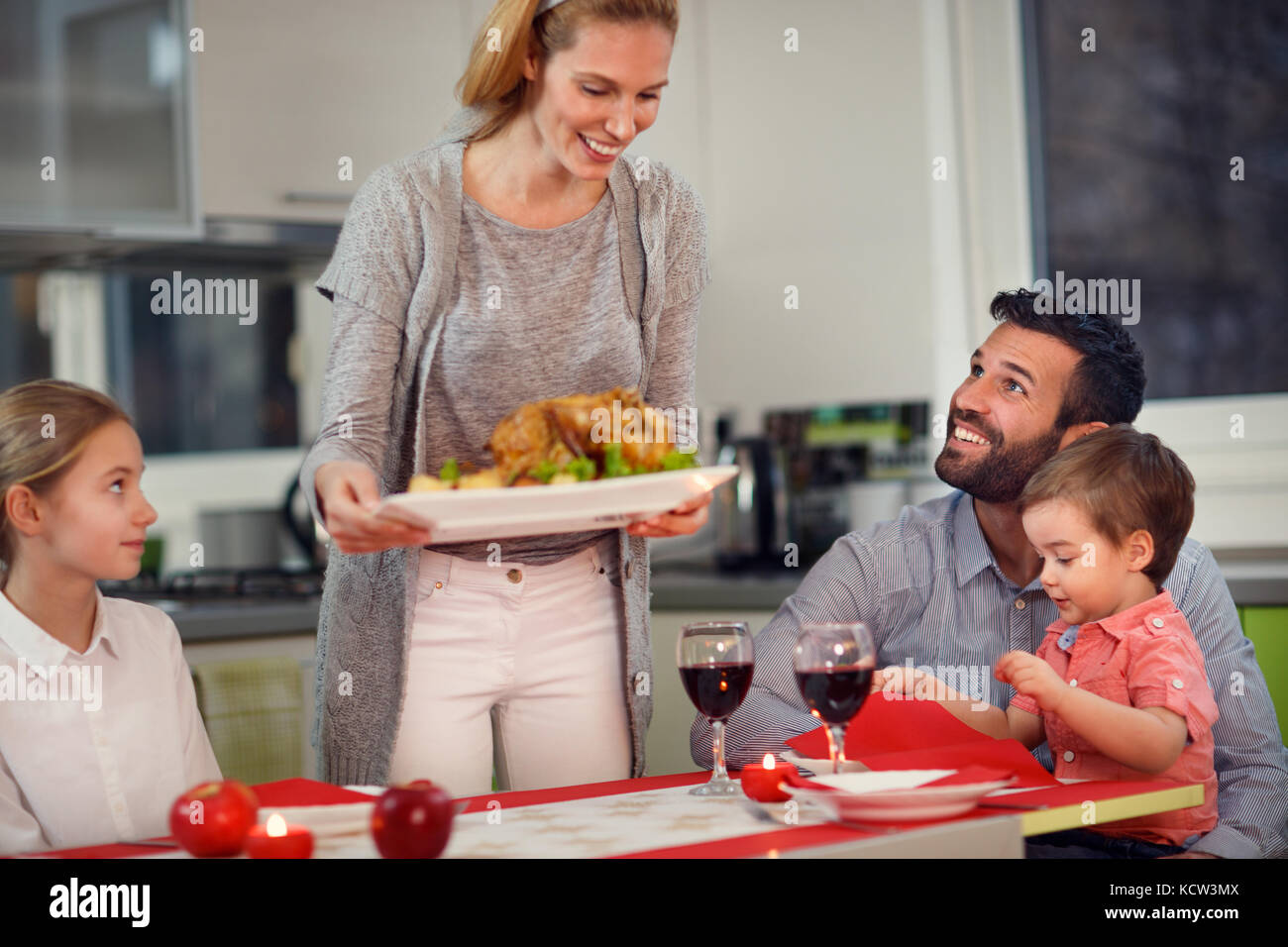 Christmas dinner, family at the table together Stock Photo - Alamy
