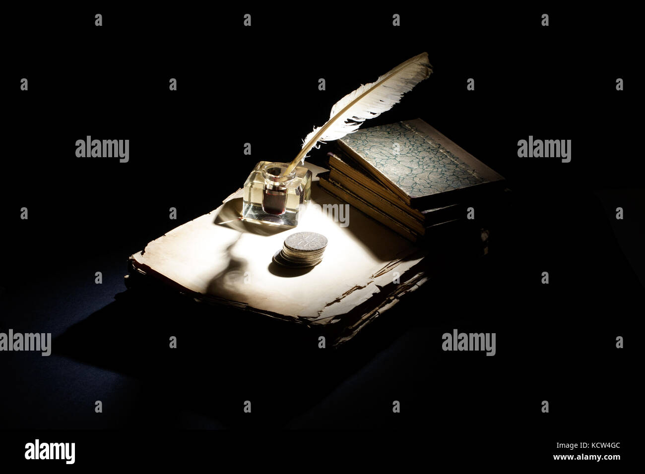 Vintage background with old ink bottle, books, papers and quill Stock ...