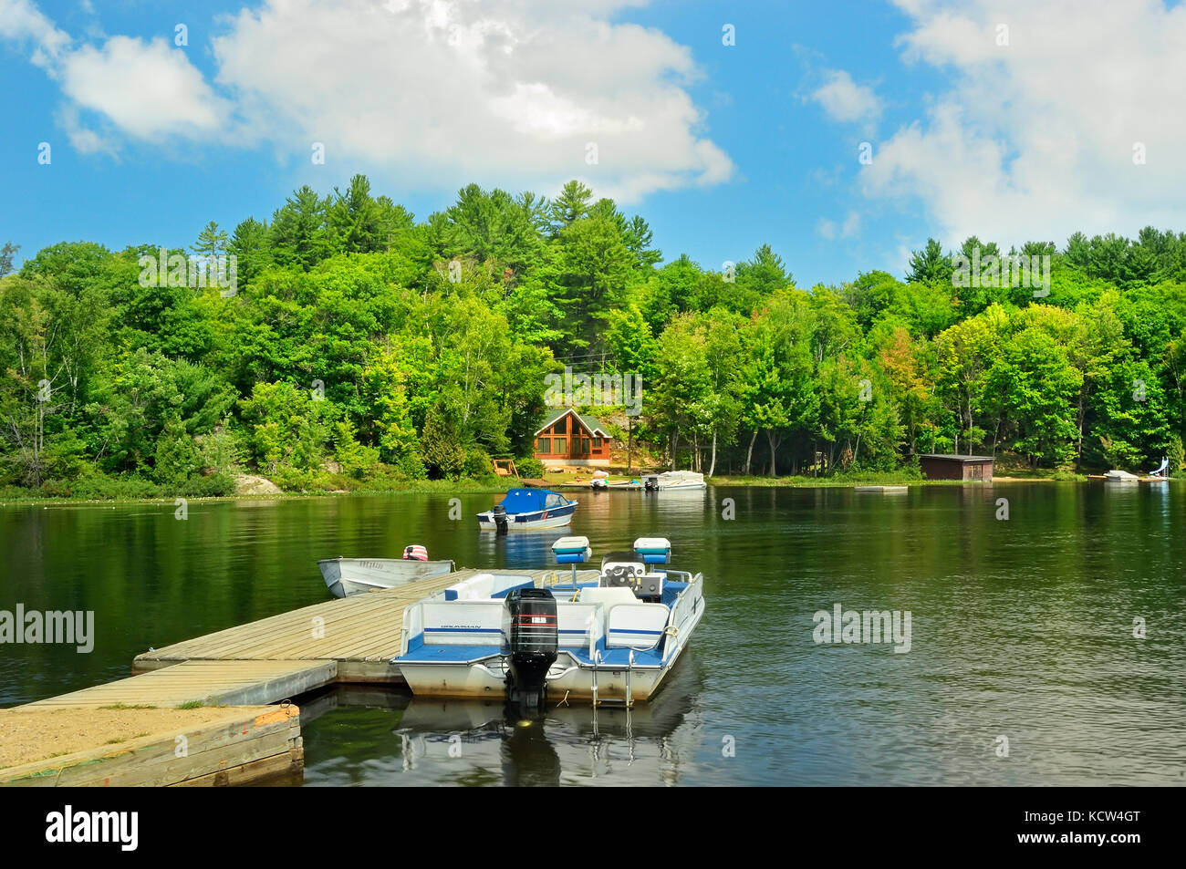 Cottage and boat on Raven Lake, Dorset, Ontario, Canada Stock Photo Alamy