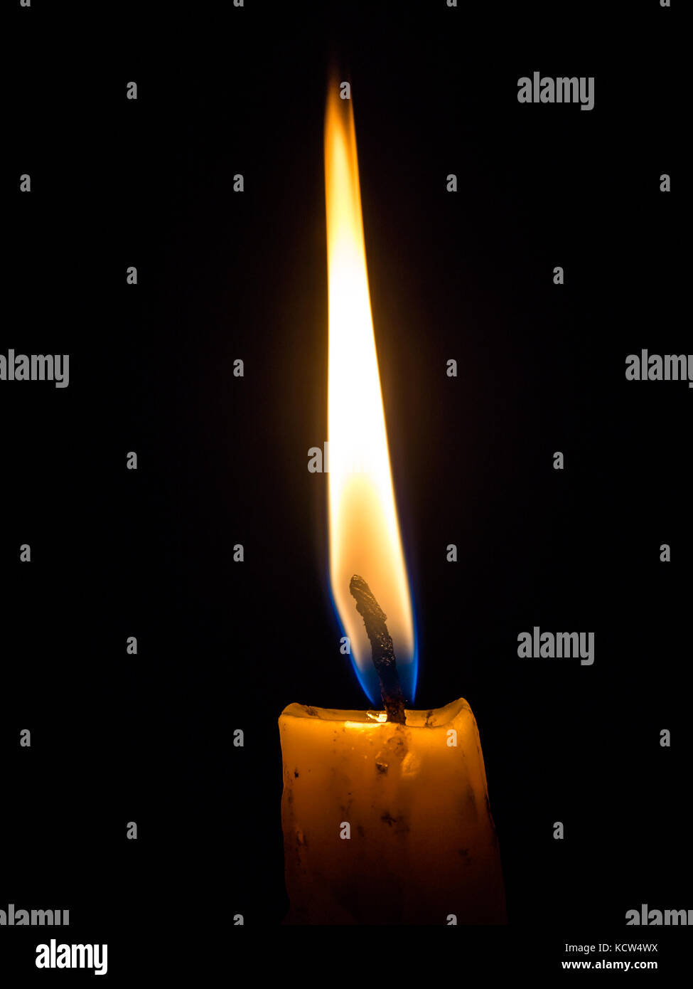 One Candle light on black background, Candlelight shines light into the
