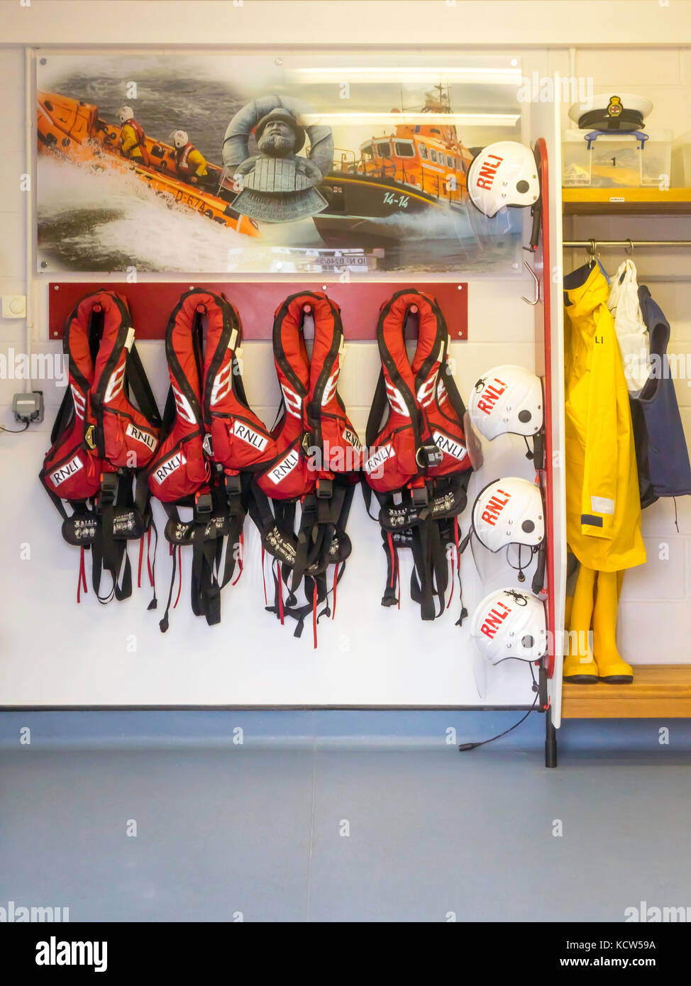 RNLI Whitby Lifebouat Station, crew life jackets and waterproof clothing hanging ready for immediate use Stock Photo