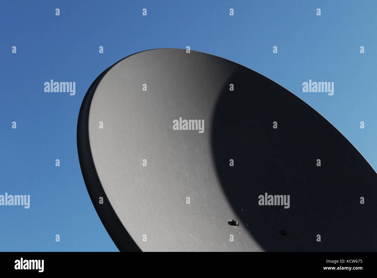 satellite dish against bue sky Stock Photo