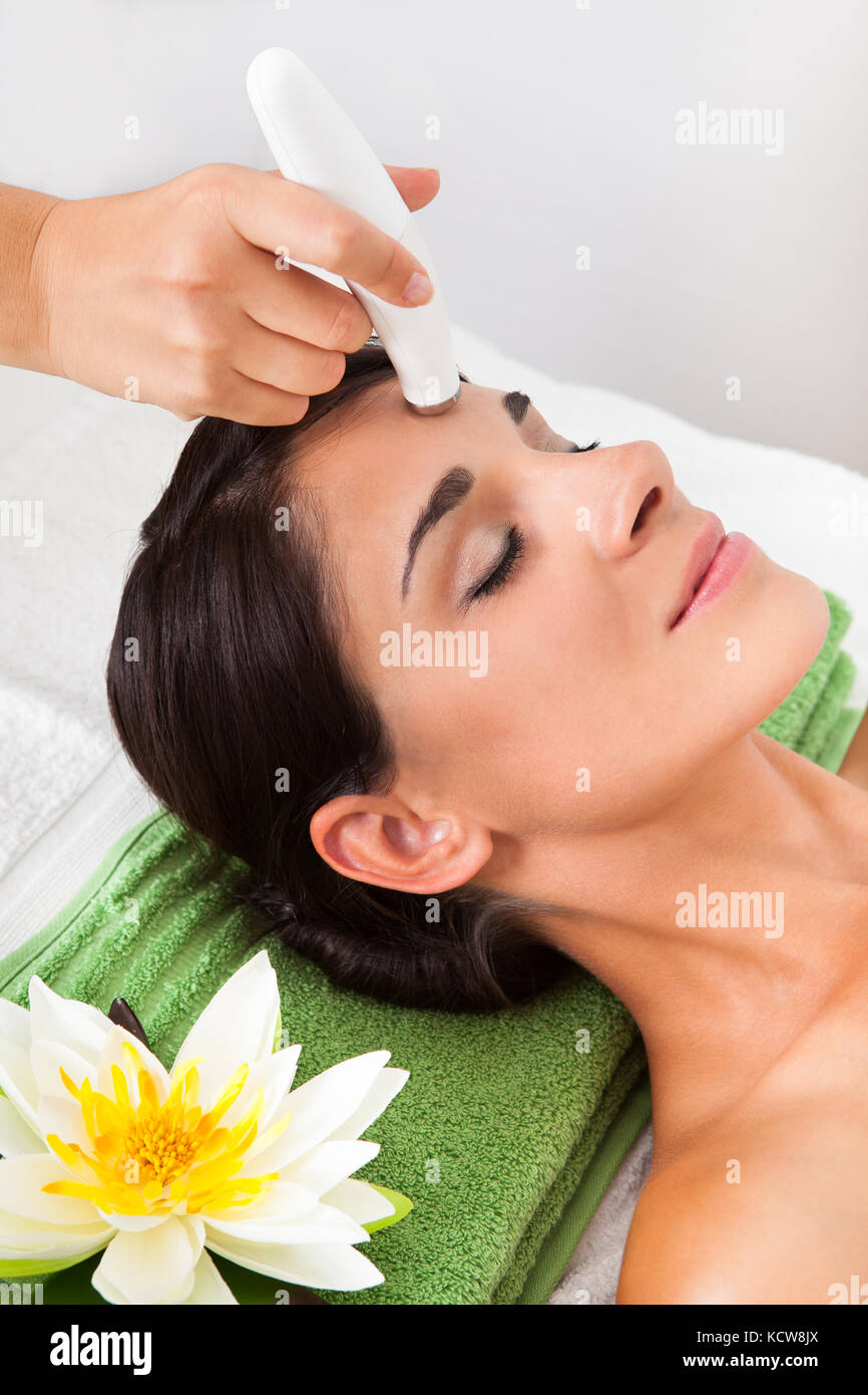 Young Woman Getting A Face Treatment In A Beauty Spa Stock Photo
