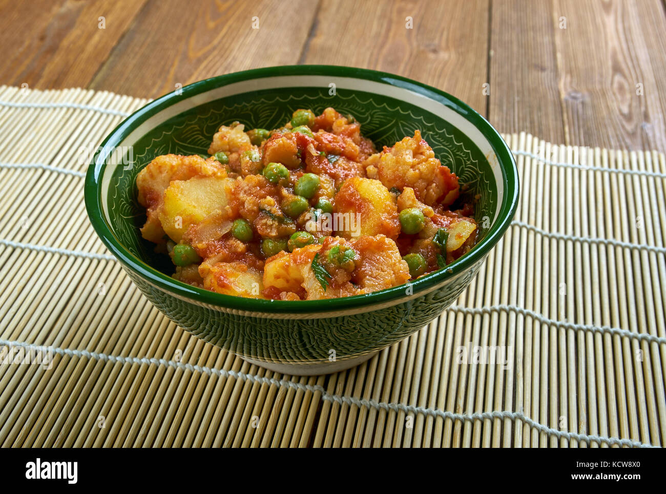 Sooka Aaloo Simla Mirch - Baby potatoes and crunchy bell peppers make this dish in Punjabi Style. Stock Photo