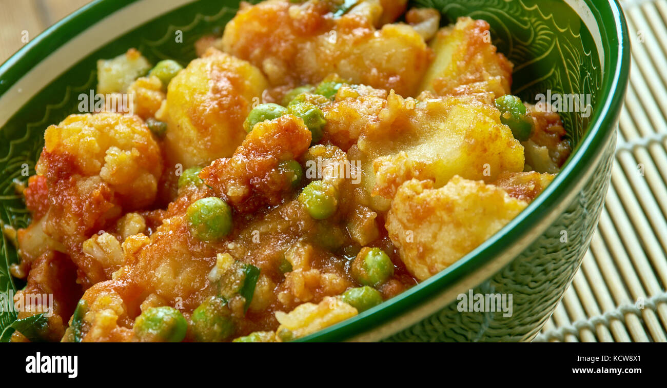 Sooka Aaloo Simla Mirch - Baby potatoes and crunchy bell peppers make this dish in Punjabi Style. Stock Photo