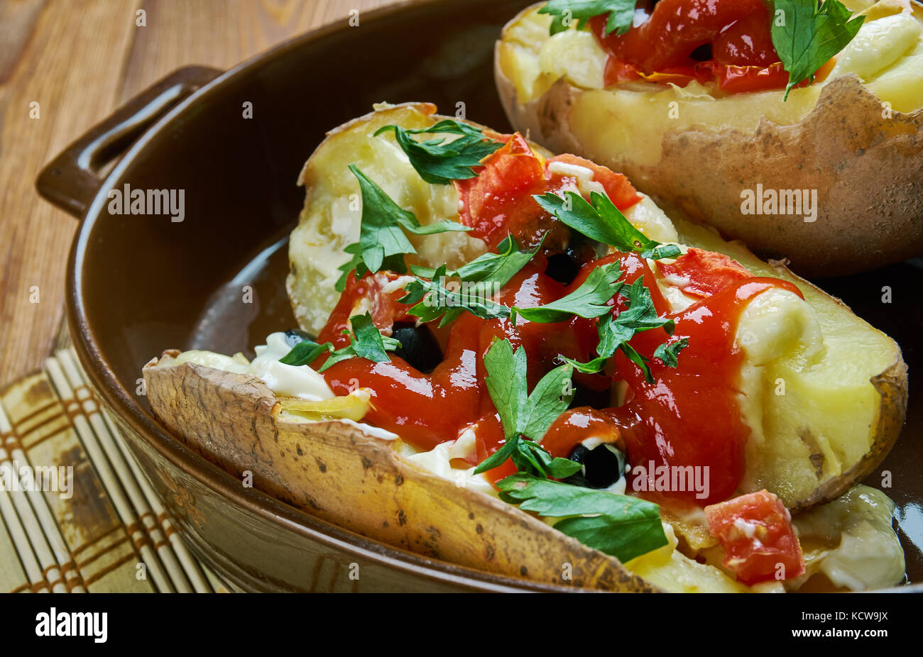 Kumpir - baked potato with various fillings is a popular fast food in Turkey. Stock Photo