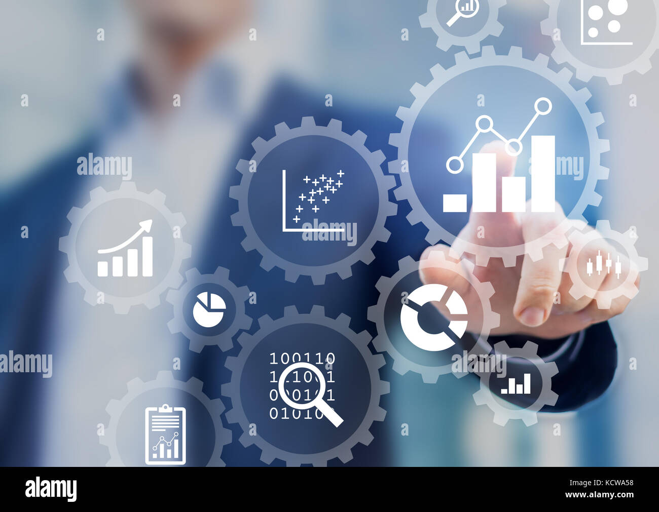 Business data analytics process management with a consultant touching connected gear cogs with KPI financial charts and graph, automated marketing das Stock Photo